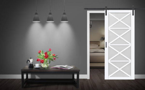 Close up of closed wooden door in the empty room with copy space