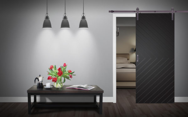 Close up of closed wooden door in the empty room with copy space