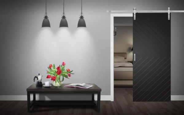 Close up of closed wooden door in the empty room with copy space