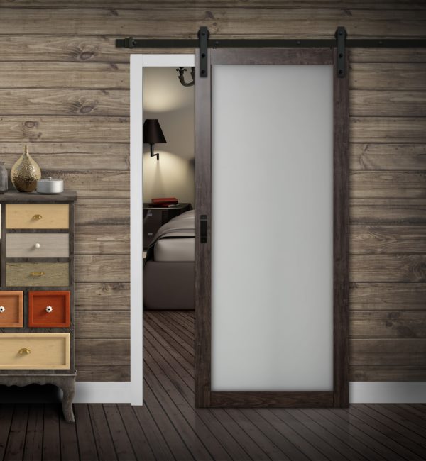 Close up of closed wooden door in the empty room with copy space