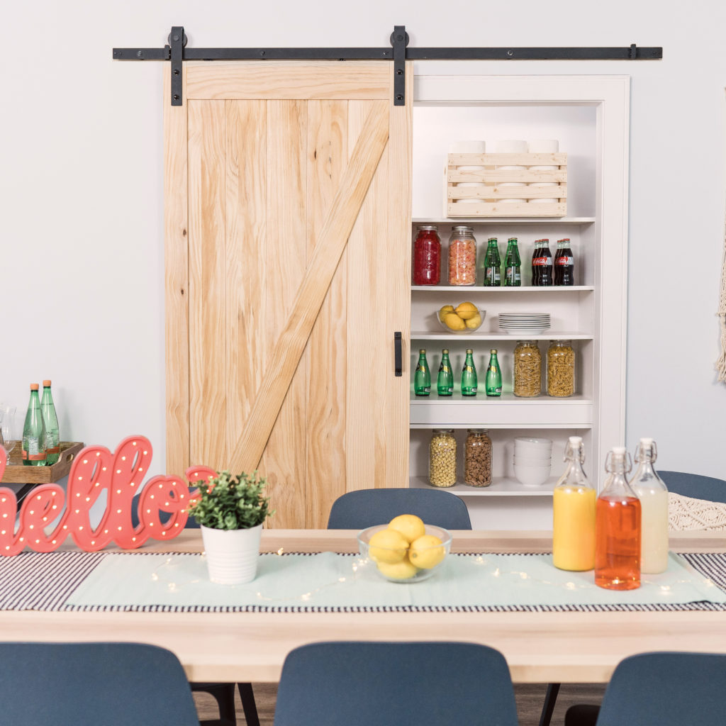 Z-Design Unfinished Closet Barn Door on a pantry in kitchen.