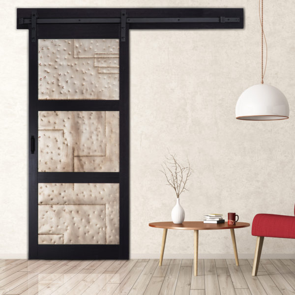 Beautiful barn door with hanging white lamp against a laugh coloured background