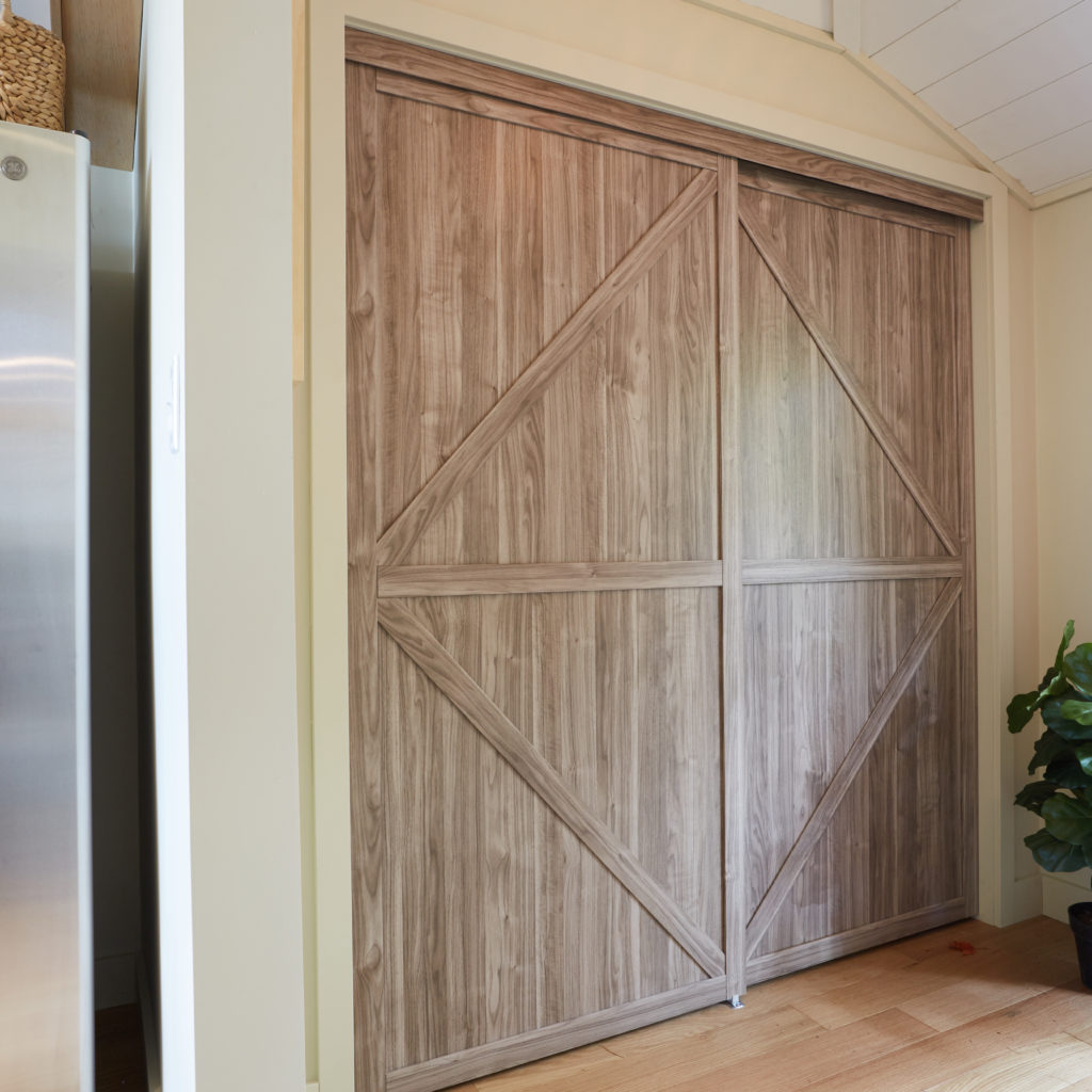 neat Trident Double K-Design Closet Door Used as a Pantry Door in Vacation House Rules on HGTV